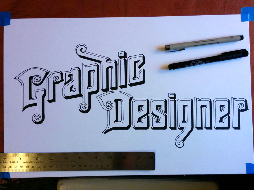 Photo of decorative hand-lettering design of the words 'Graphic Designer.'